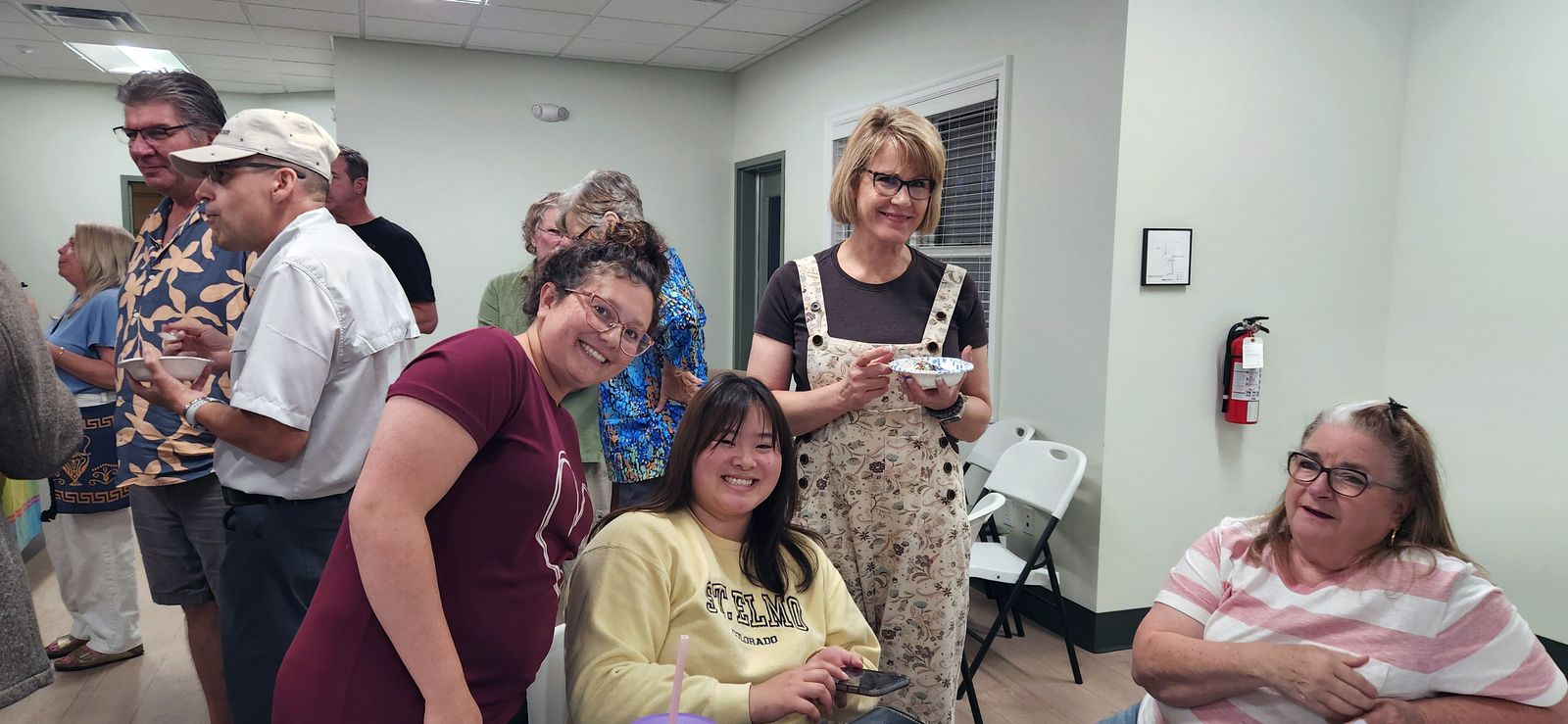 Club members laughing together at the club ice cream social